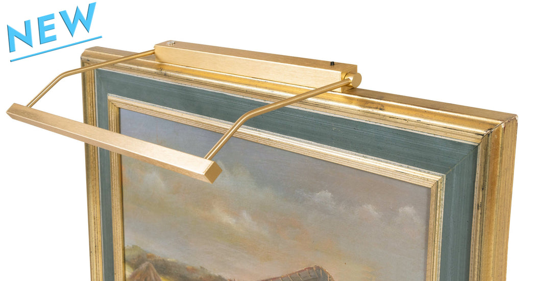 Close-up of the Rechargeable Vision Series, a premium rechargeable picture light, elegantly mounted on a framed artwork for wireless, remote-controlled LED illumination.