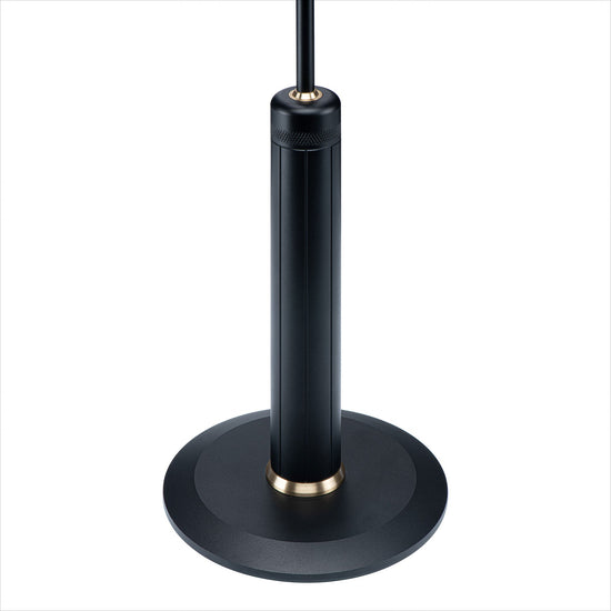 Sleek base of the LightBob™ Task Floor Light featuring a classic black finish with elegant brass accents, designed to support the adjustable LED task lighting structure.