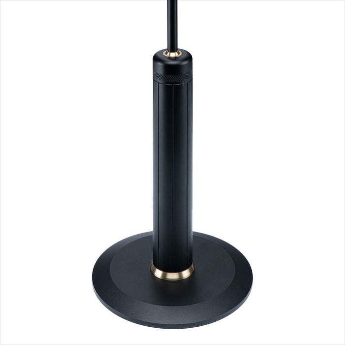 Sleek base of the LightBob™ Task Floor Light featuring a classic black finish with elegant brass accents, designed to support the adjustable LED task lighting structure.